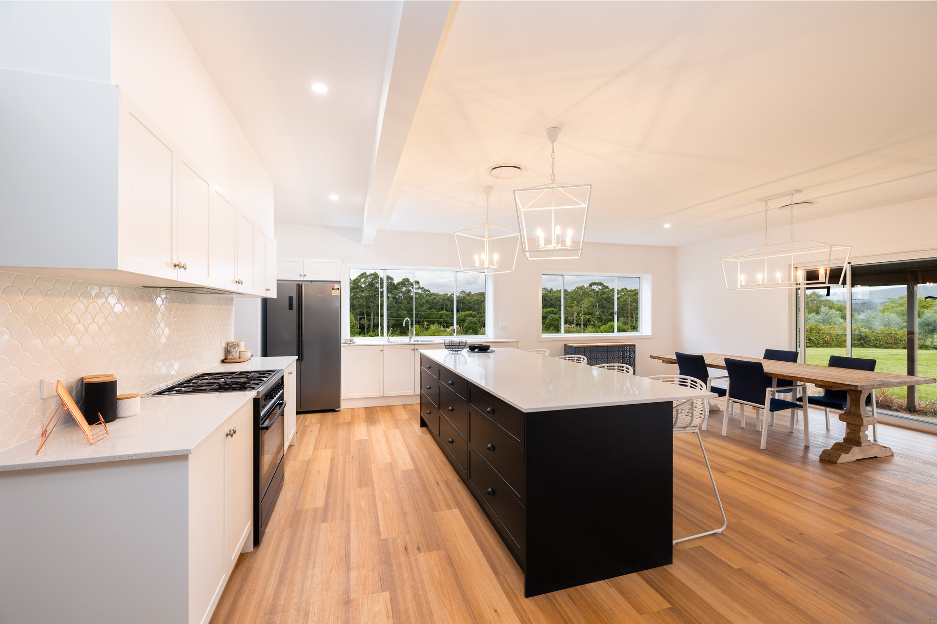 Large kitchen and dining entertaining space with Country Hampton design and modern home build